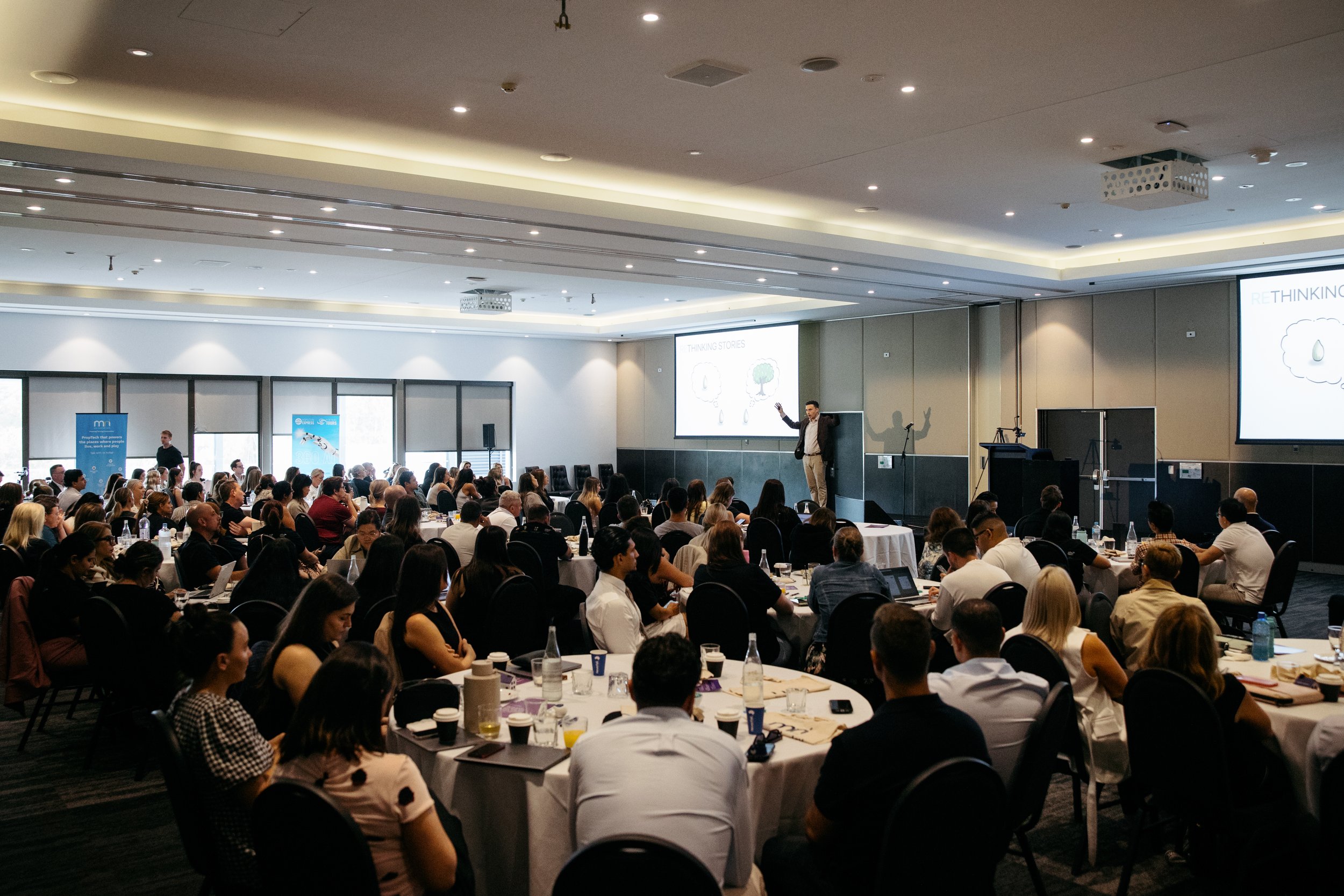 Wide view of a Sydney conference audience during a keynote