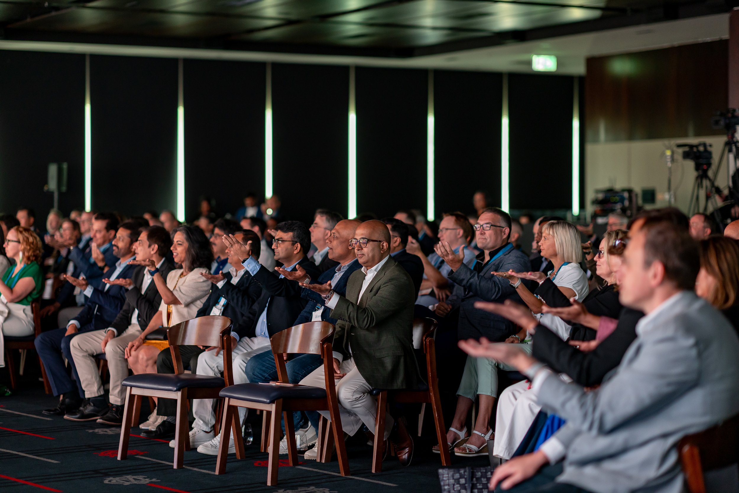 Corporate audience listening to a keynote presentation in Sydney