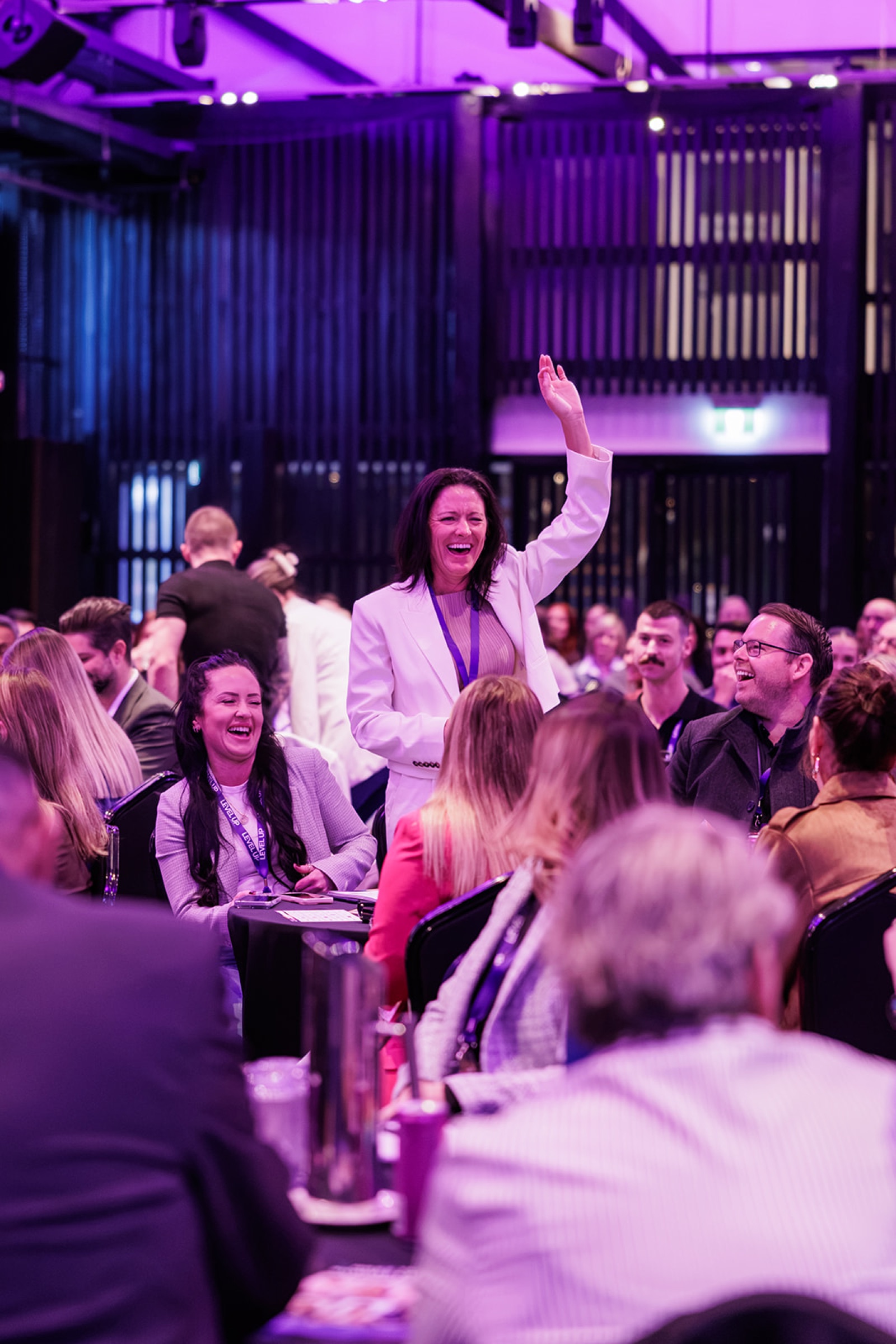 A guest laughing during Andy Nunn's interactive corporate entertainment at the BDM Summit