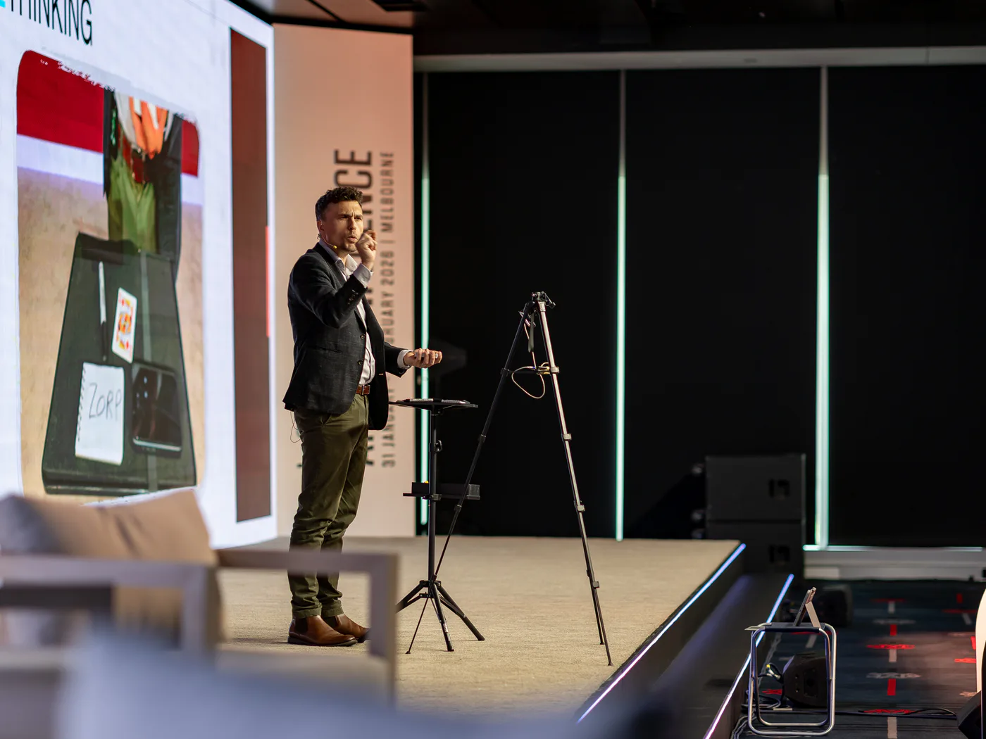 Andy Nunn presenting a leadership keynote at an APAC corporate conference