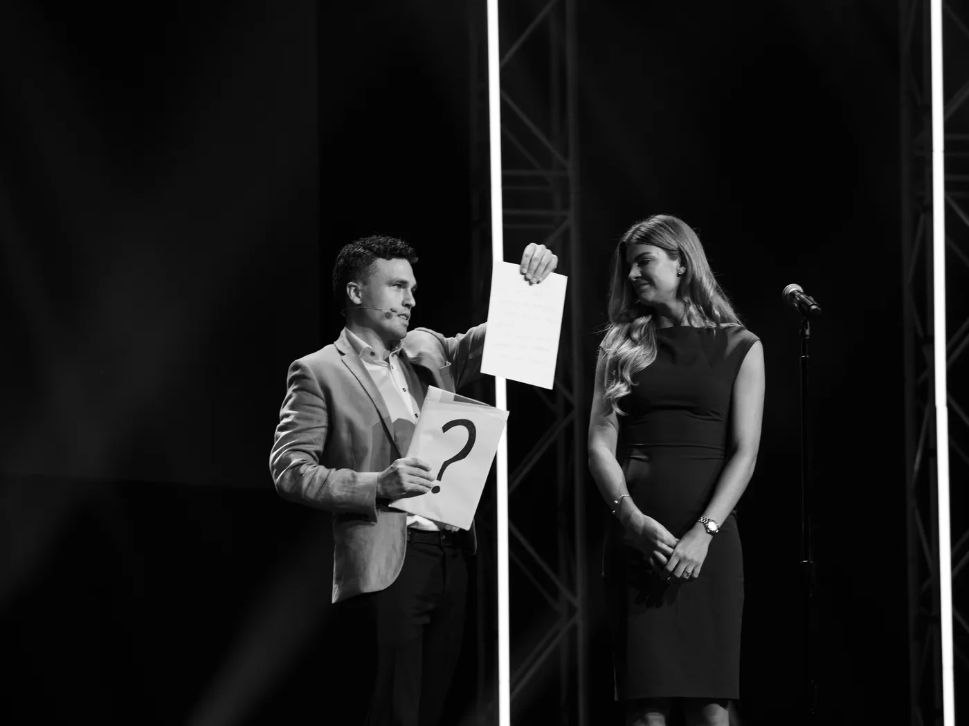 Motivational speaker Andy Nunn sharing a stage demonstration with an audience volunteer