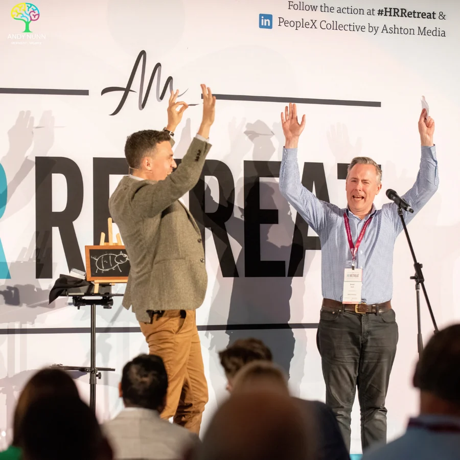 Andy Nunn keynote speaker leading a live mentalism demonstration on stage