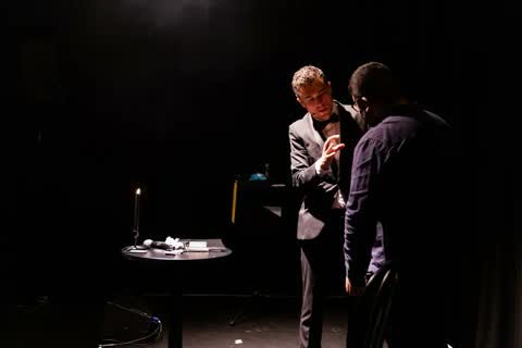 Andy Nunn performing stage mentalism with a corporate event volunteer
