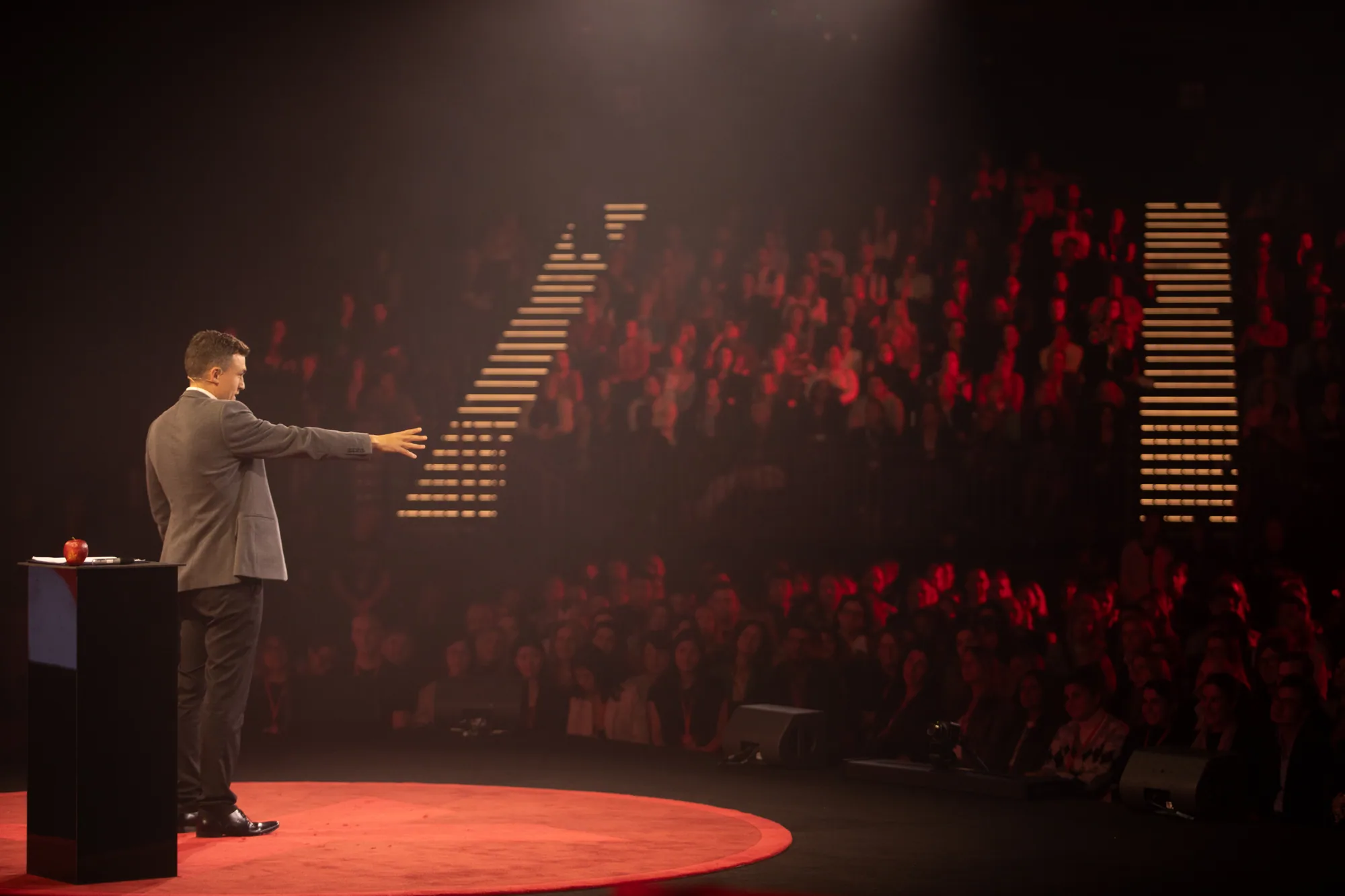 Andy Nunn presenting a keynote to a large Australian conference audience